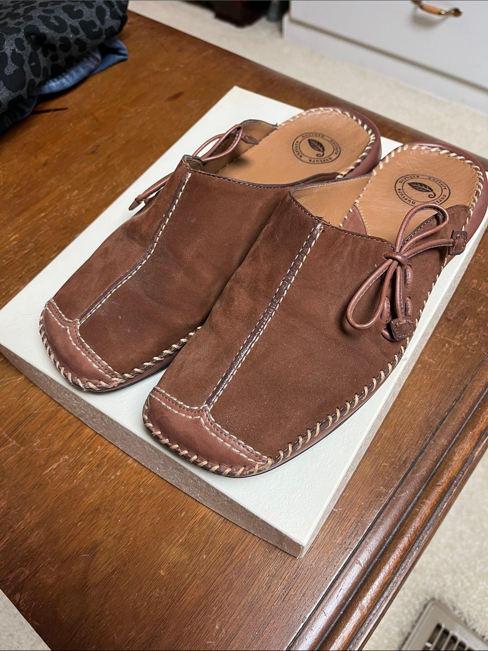 Nurture Brown Leather Slip-On women’s mules.